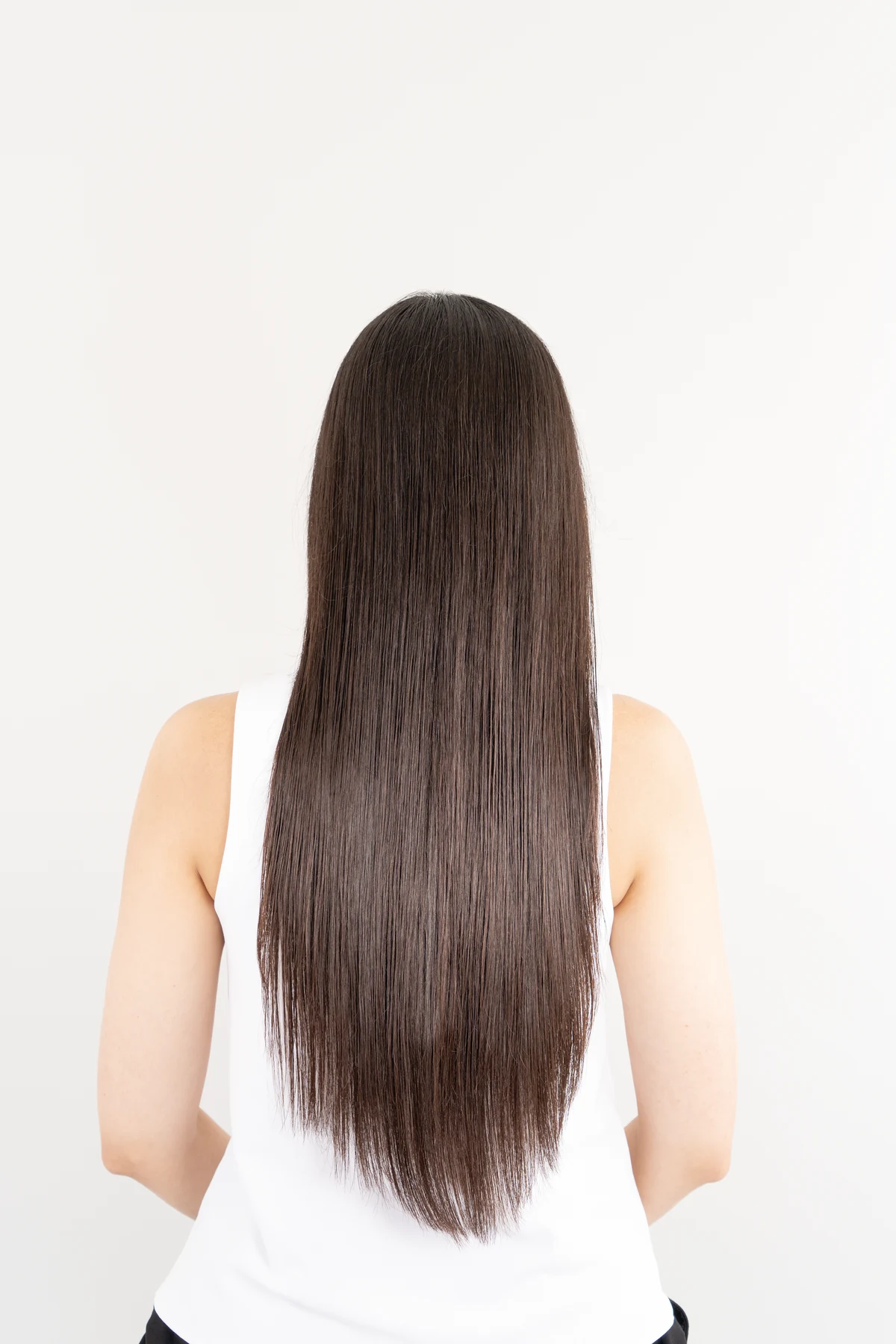 ロングヘアにソニックヒートアイロンIPを使用した後の背面